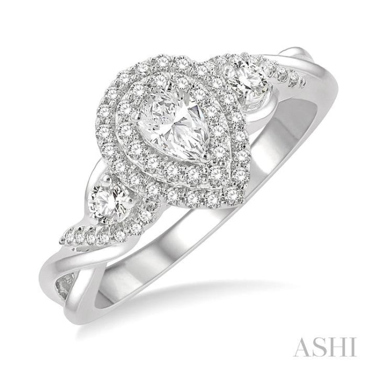 1/6 ctw Criss-Cross Baguette and Round Cut Diamond Fashion Ring in