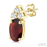 1/20 Ctw Oval Cut 5X3 MM Garnet and Round Cut Diamond semi-precious Earrings in 10K Yellow Gold