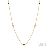 2.25 MM Emerald and 1/4 Ctw Round Cut Diamond Precious Station Necklace in 14K Yellow Gold