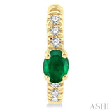 4X3 MM Oval Cut Emerald and 1/10 Ctw Petite Round Cut Diamond Fashion Huggies in 10K Yellow Gold