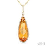 26x9 MM Pear Cut Citrine and 1/4 Ctw Round Cut Diamond Halo Semi-Precious Pendant With Chain in 14K Yellow Gold
