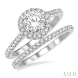 7/8 Ctw Round Cut Diamond Wedding Set With 3/4 Ctw Round Cut Engagement Ring and 1/6 Ctw Wedding Band in 14K White Gold